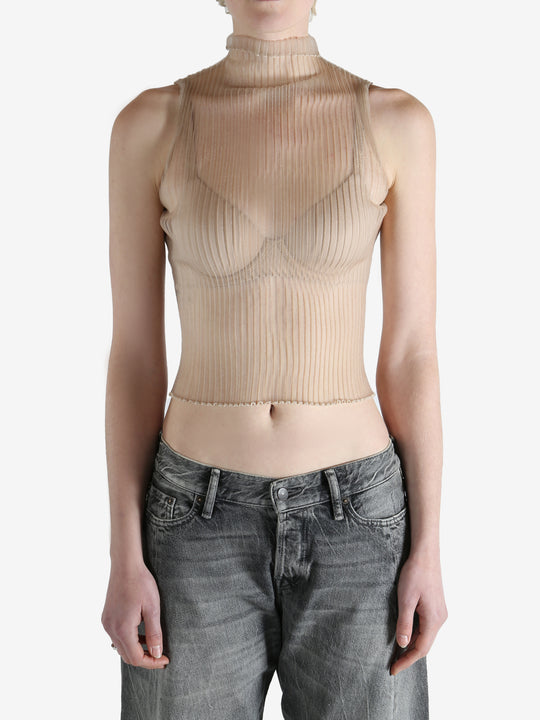 beige ribbed tank top worn by a person, showing the top fit