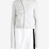 Grey hoodie worn by a person, showing the hoodie fit