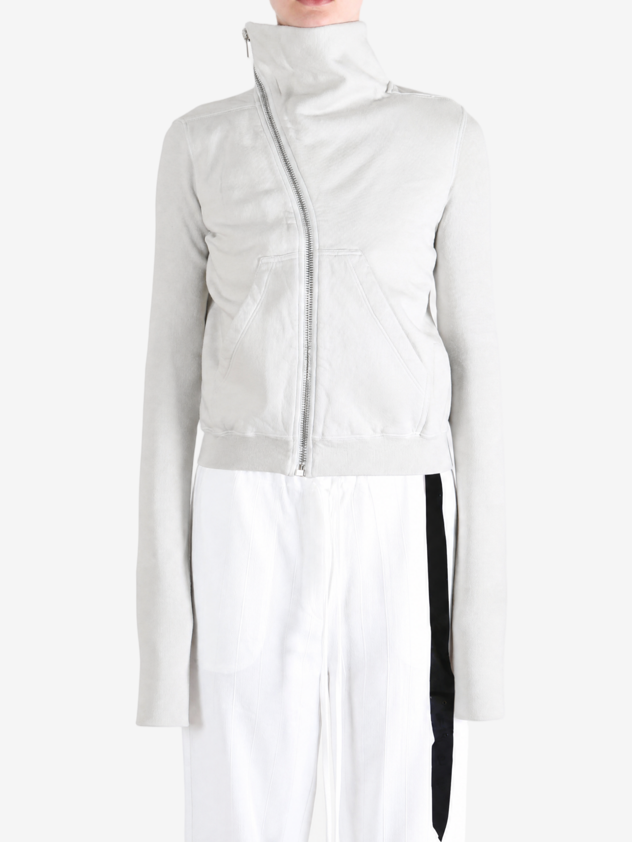 Grey hoodie worn by a person, showing the hoodie fit