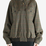 Brown jacket worn by a person, showing the jacket's fit