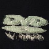 Close up of the black t-shirt, showing texture of the cotton fabric