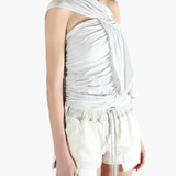 White tops worn by a person, showing the tops fit