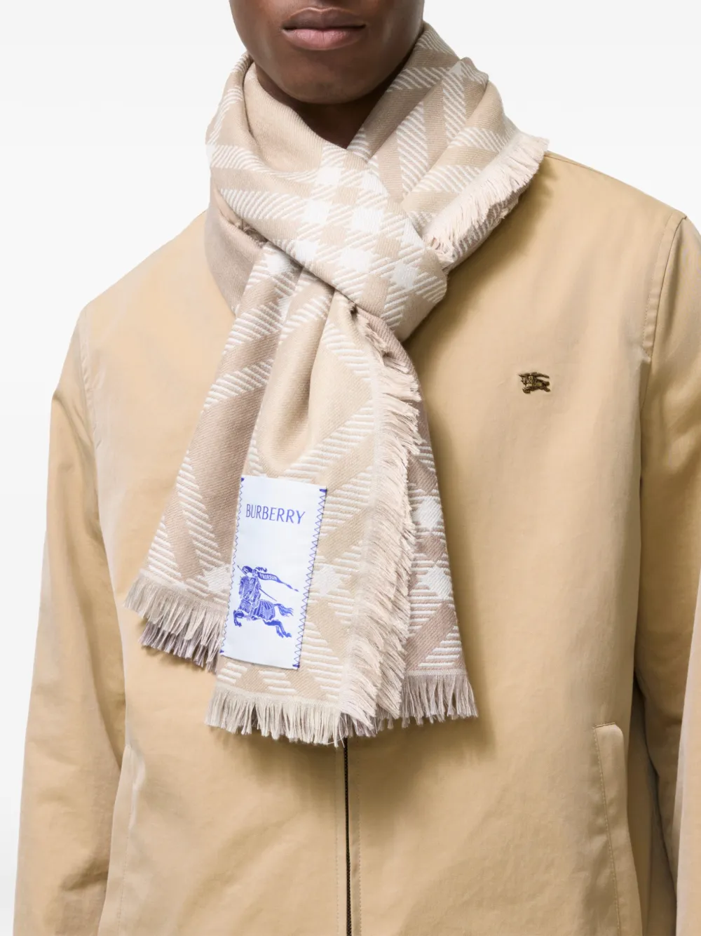 Brown scarf worn by a person, showing the scarf fit