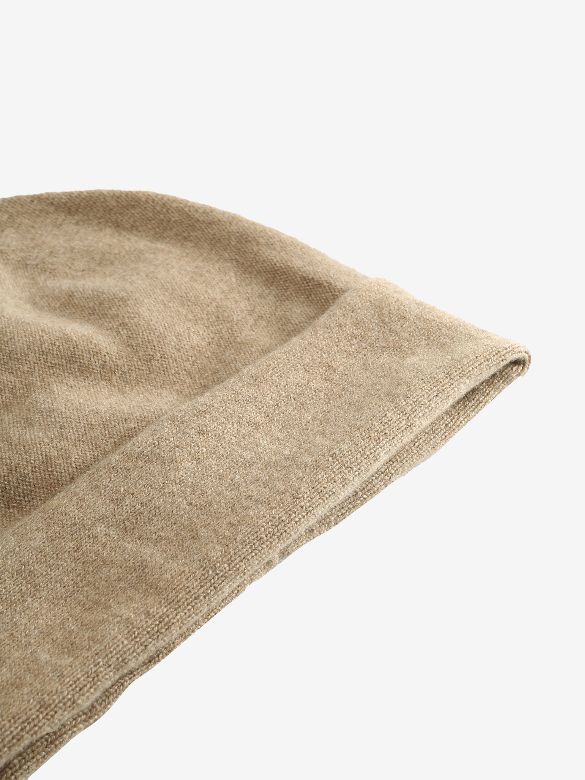Close up of tan hats, showing texture of the cashmere fabric