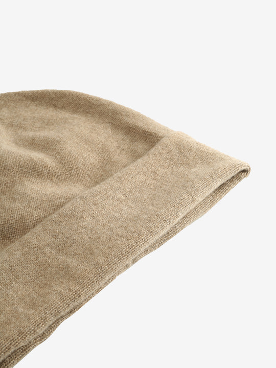 Close up of tan hats, showing texture of the cashmere fabric