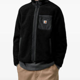 Black jacket worn by a person, showing the jacket fit