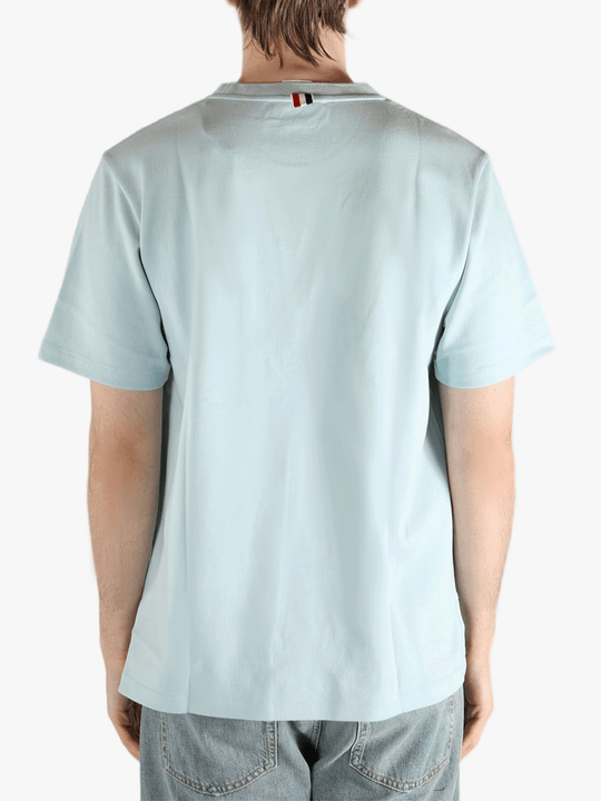 Blue t-shirt worn by a person, showing the t-shirt fit