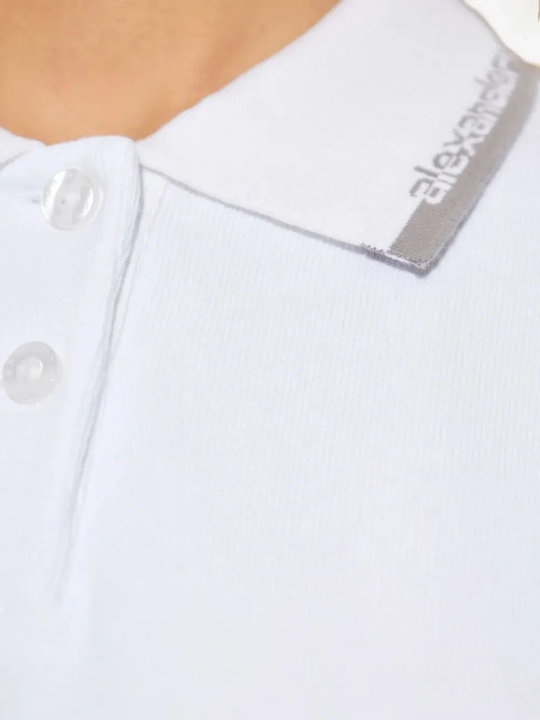 Close up of white dress, showing texture of the Cotton fabric