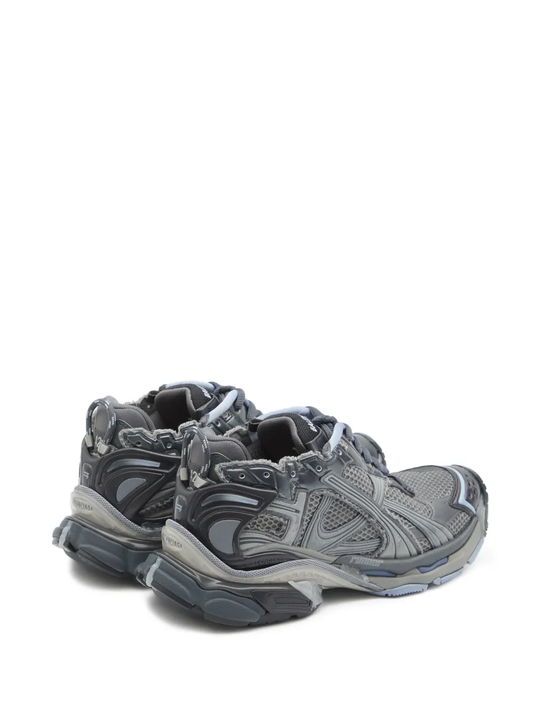 Grey sneakers, back view