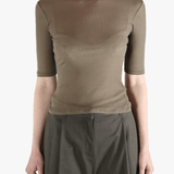 Brown t-shirt worn by a person, showing the t-shirt's fit