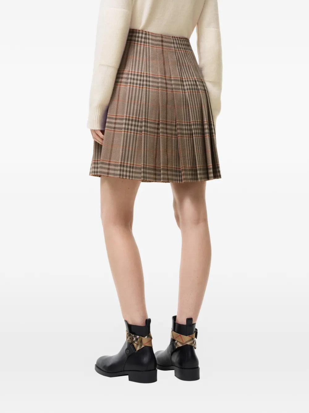 Tan skirt worn by a person, showing the skirt fit