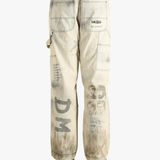 Grey pants worn by a person, showing the pants fit