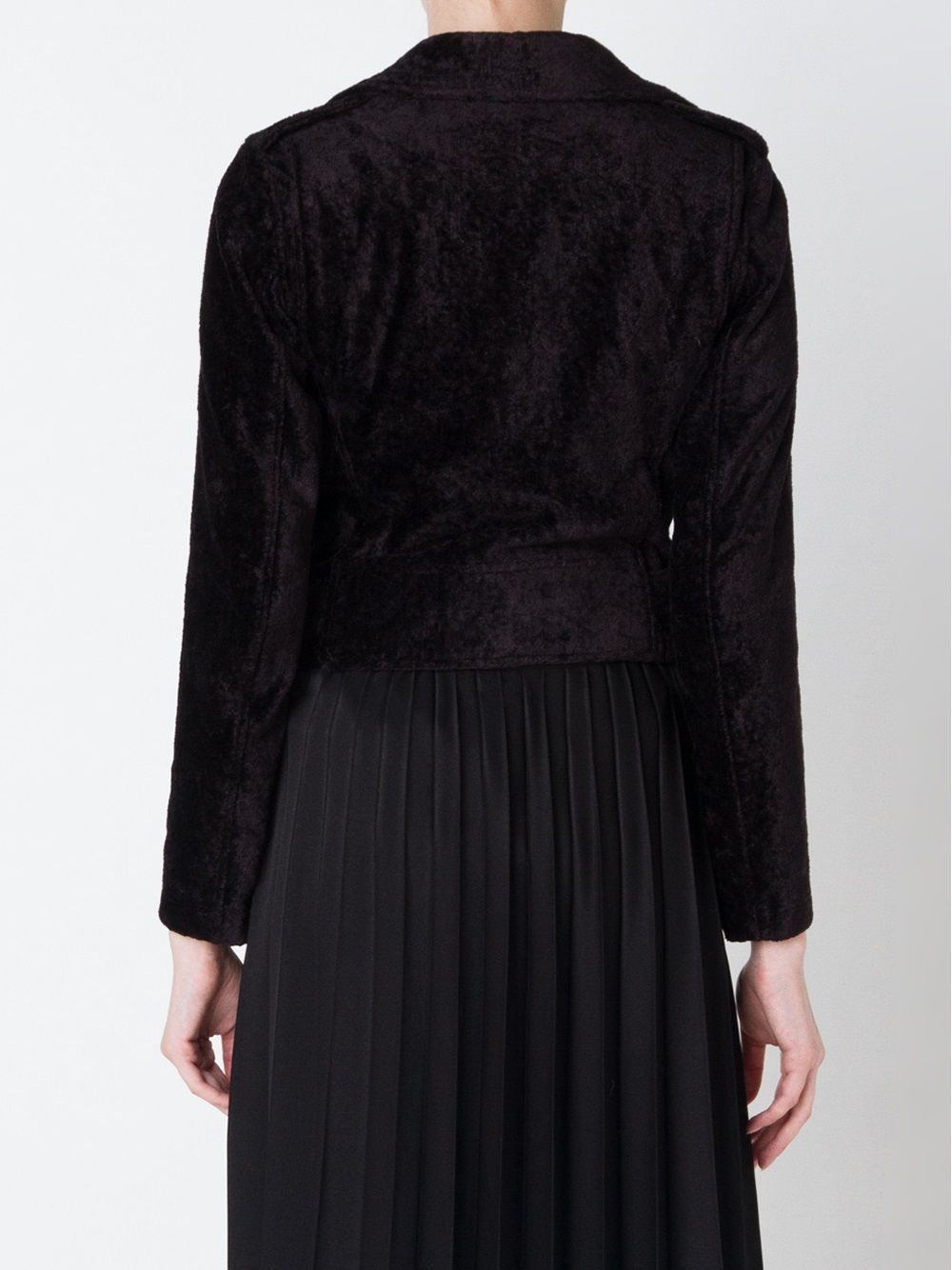 Black jacket worn by a person, showing the jacket's fit