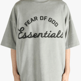 Grey t-shirt worn by a person, showing the t-shirt's fit