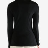 Black t-shirt worn by a person, showing the shirt's fit