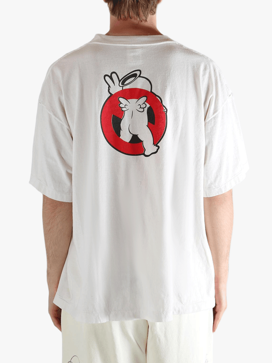 White t-shirt worn by a person, showing the shirt's fit