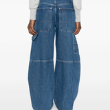 blue jeans worn by a person, showing the jeans fit