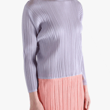 Purple shirt worn by a person, showing the shirt's fit