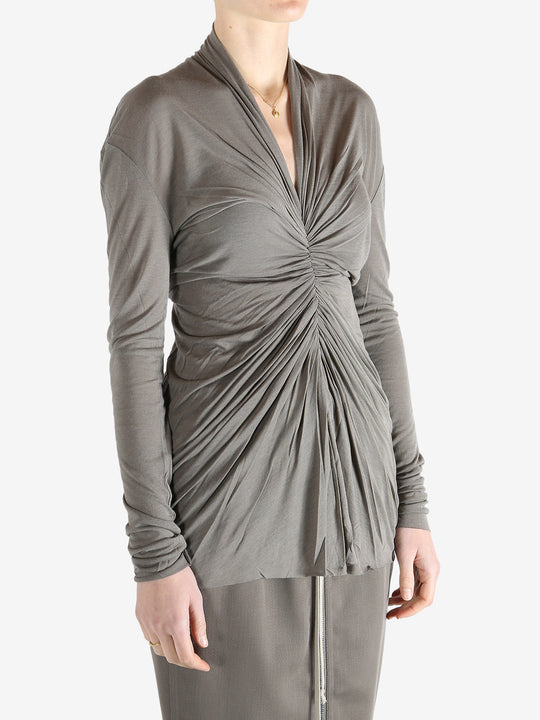 Grey t-shirt worn by a person, showing the t-shirt's fit