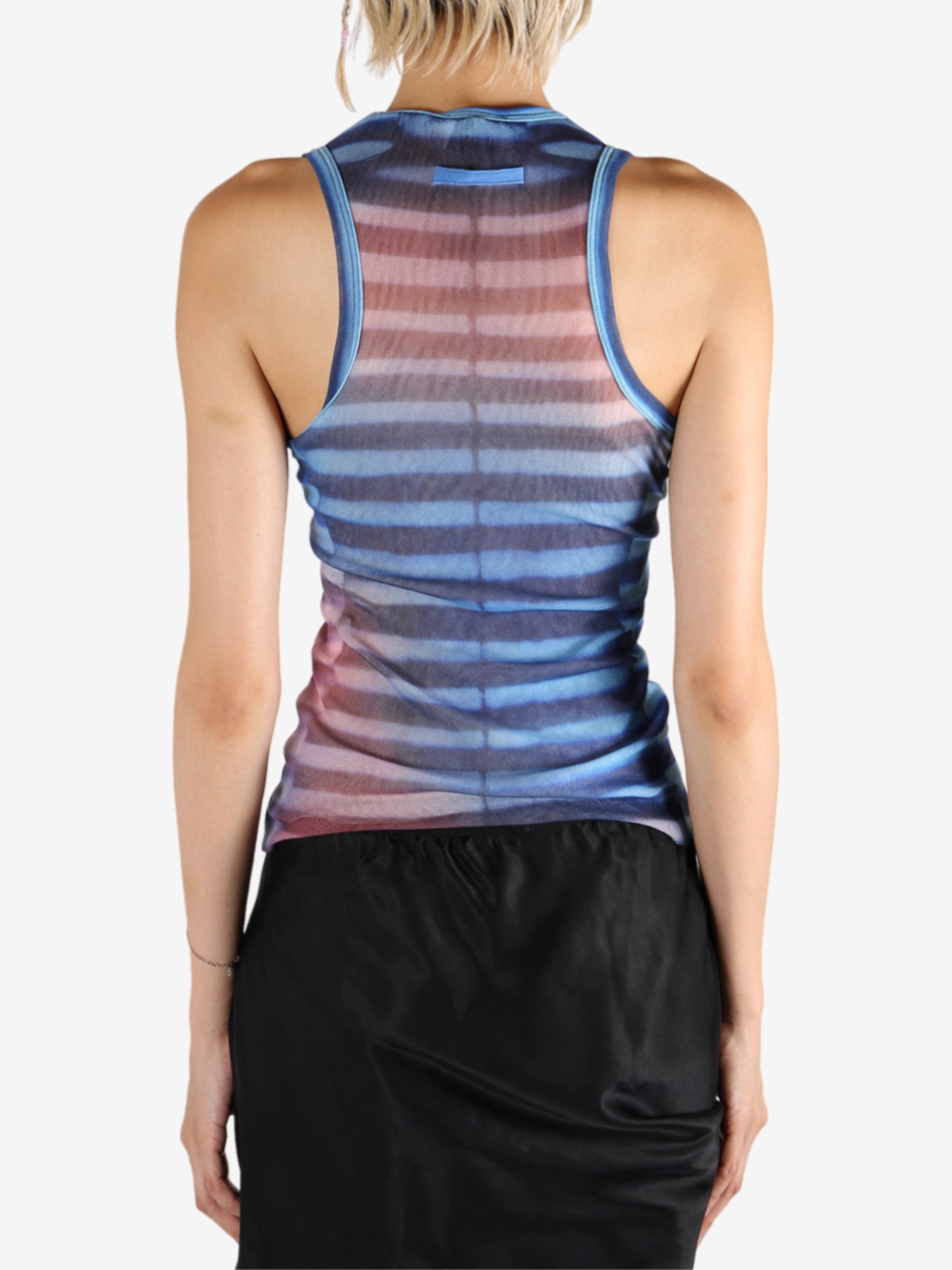 Blue top worn by a person, showing the top's fit