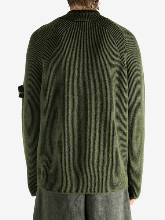 Green shirt worn by a person, showing the shirt's fit