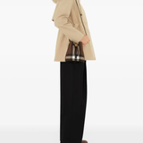 Brown bag worn by a person, showing the bag's fit