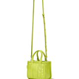 Close up of green bag, showing texture of the cow leather fabric
