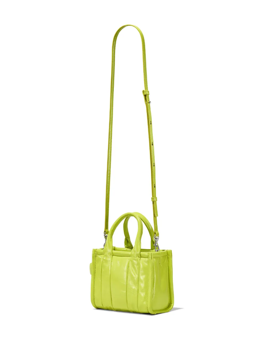 Close up of green bag, showing texture of the cow leather fabric
