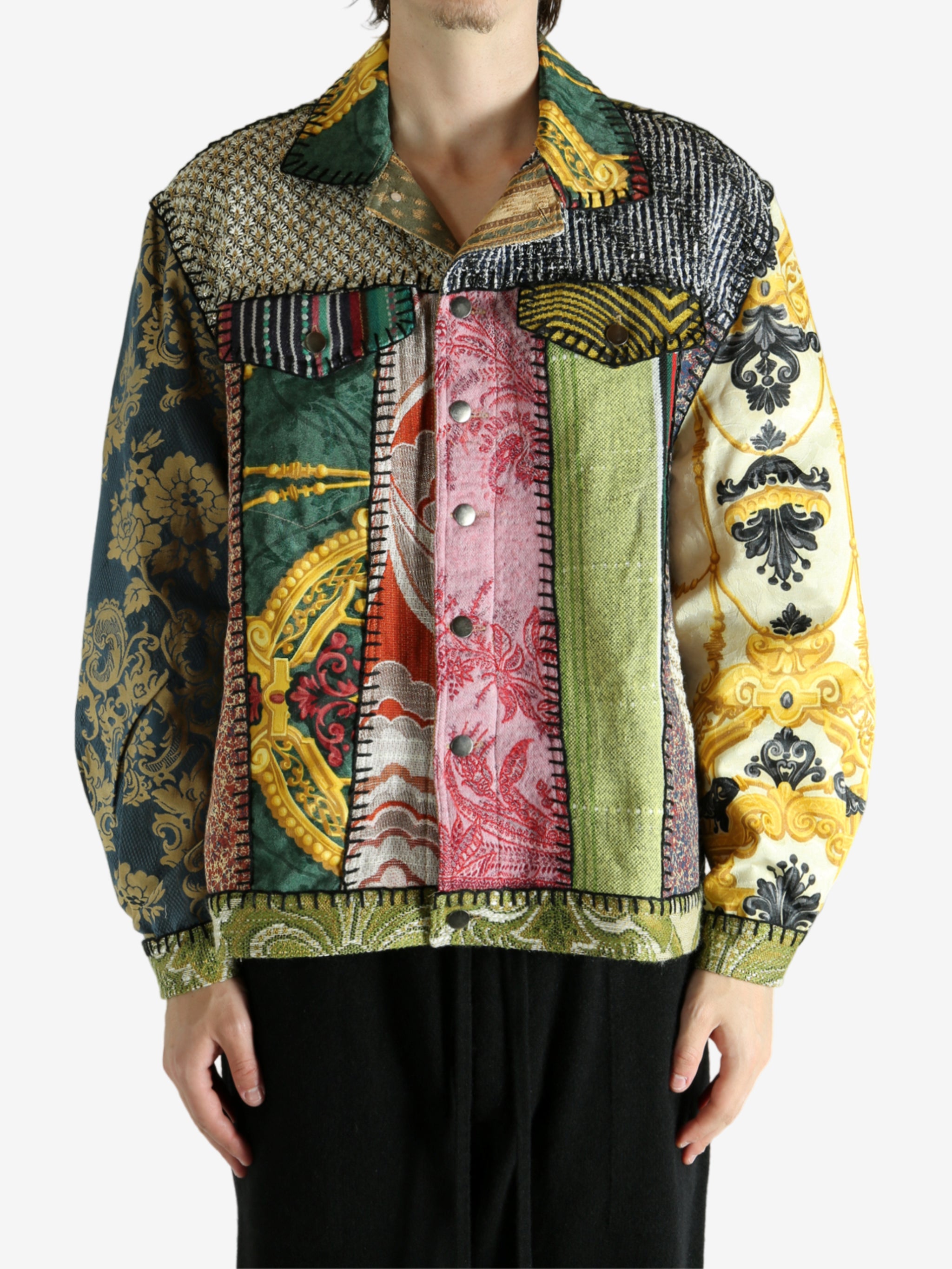 Green jacket worn by a person, showing the jacket‘s fit