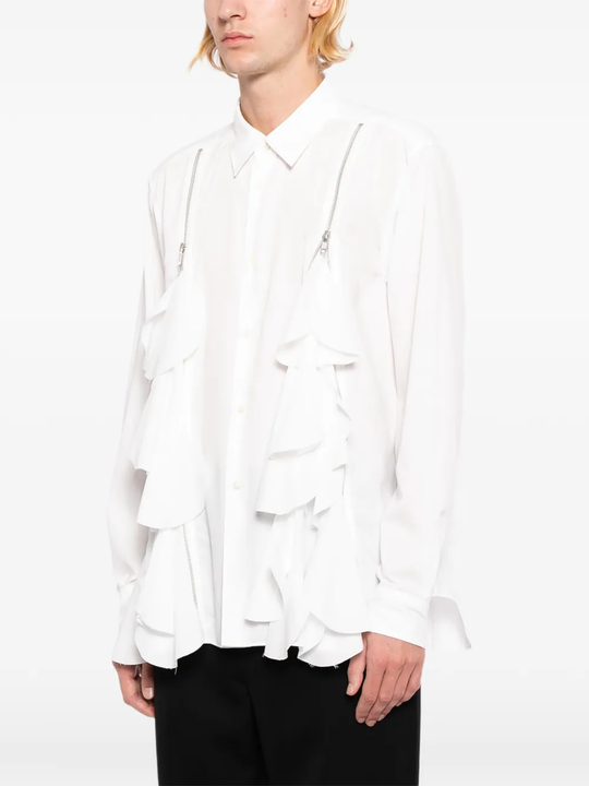 White shirt worn by a person, showing the shirt fit
