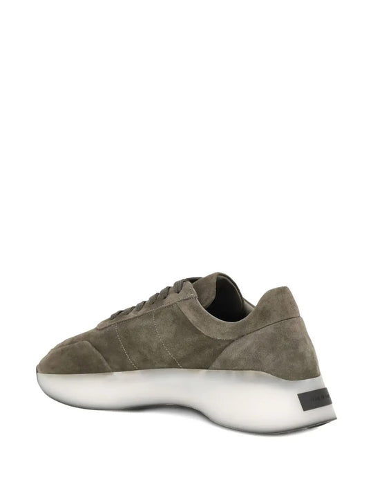 Grey sneakers, back view