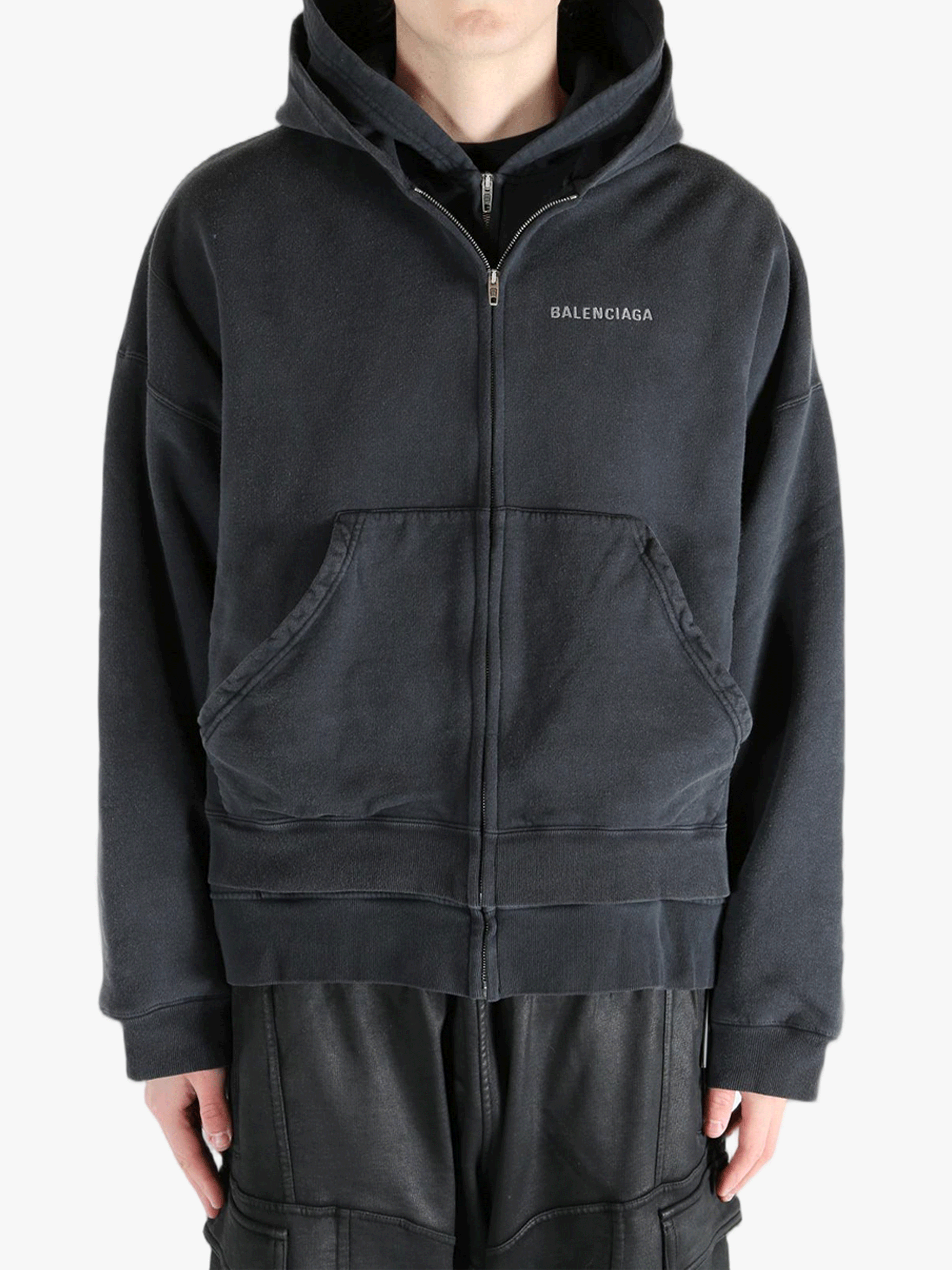 Black jackets worn by a person, showing the jackets fit