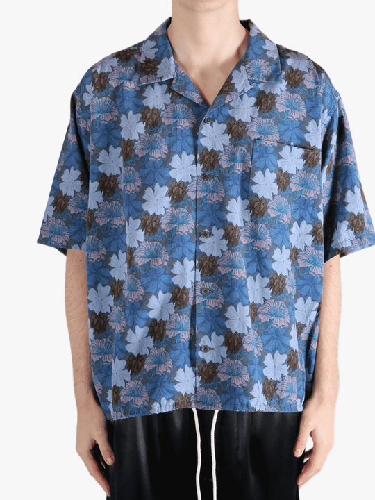 Navy shirt worn by a person, showing the shirt's fit