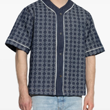 Blue shirt worn by a person, showing the shirt's fit