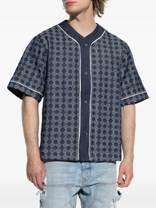 Blue shirt worn by a person, showing the shirt's fit