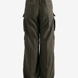 Brown pants worn by a person, showing the pants's fit