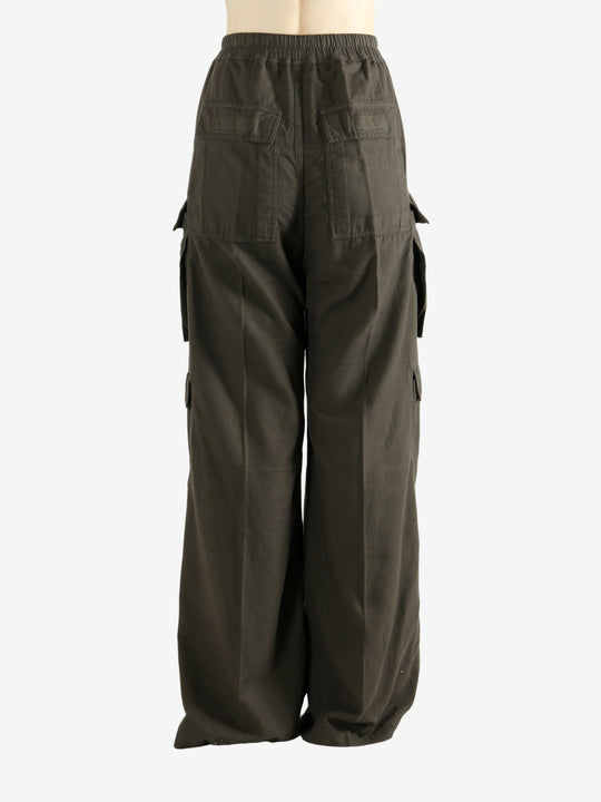 Brown pants worn by a person, showing the pants's fit