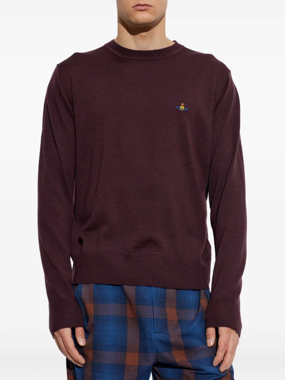 Burgundy hoodie worn by a person, showing the hoodie fit