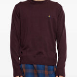 Burgundy hoodie worn by a person, showing the hoodie fit