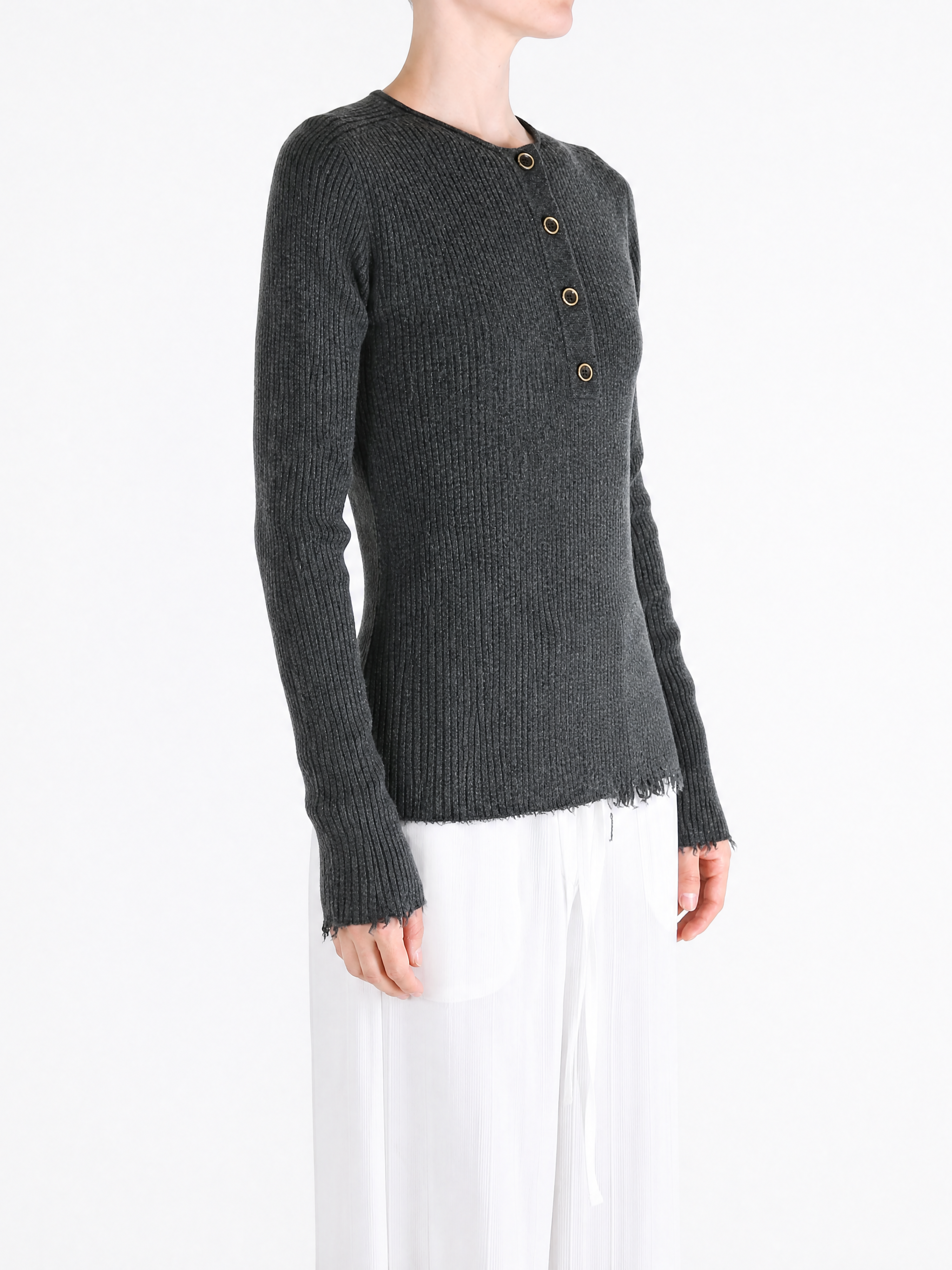 Grey top worn by a person, showing the top fit