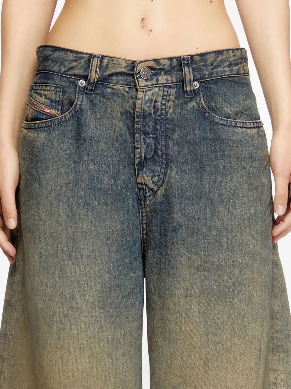 Close up of the blue shorts, showing texture of the lyocell fabric