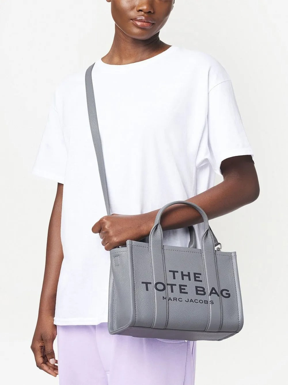 Grey bag worn by a person, showing the bag's fit