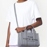 Grey bag worn by a person, showing the bag's fit