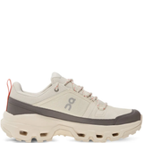 Tan sneakers, front view