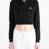 Black hoodie worn by a person, showing the hoodie's fit