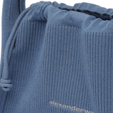 Close-up of  blue bag, showing texture of the cotton fabric