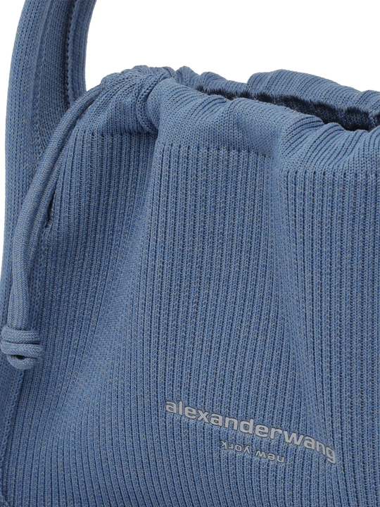 Close-up of  blue bag, showing texture of the cotton fabric