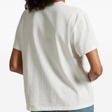 White t-shirt worn by a person, showing the t-shirt fit