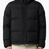 Black jacket worn by a person, showing the jacket fit