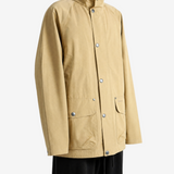 Tan jacket worn by a person, showing the jacket fit